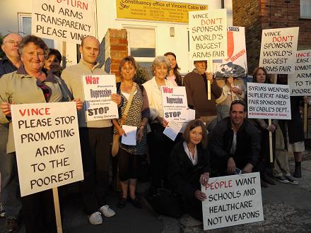 Vince Cable Arms Protest