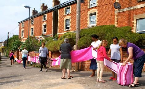 pink scarf along street