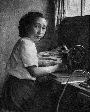 Lady at a sewing machine