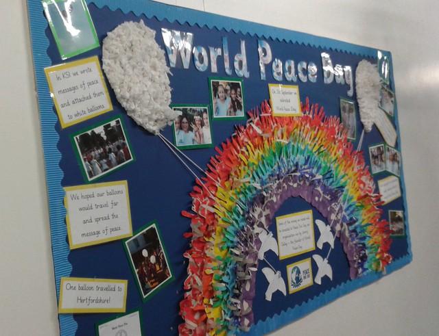 school display about world peace day with a paper rainbow