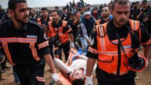 casualty being carried on a stretcher