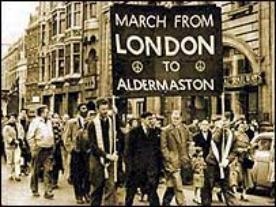 protestors marching with a  banner reading March from London to Aldermaston