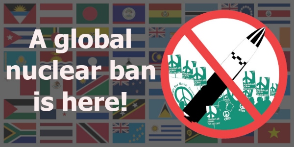A global nuclear ban is here (on a background of national flags)