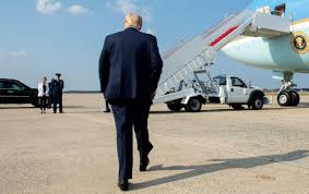 President Trump walks away from us to a waiting aeroplane
