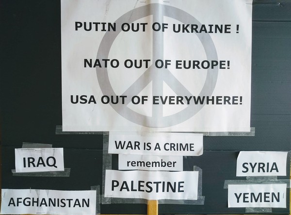 Poster: Putin out of Ukraine! NATO out of Europe! USA out of everywhere!